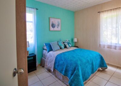 Habitación principal del departamento nuevo Nâjil en el desarrollo Alôja, Cancún