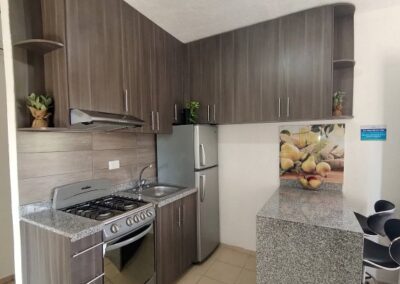 Cocina del departamento Brisa en el desarrollo Villa El Cielo, Villahermosa